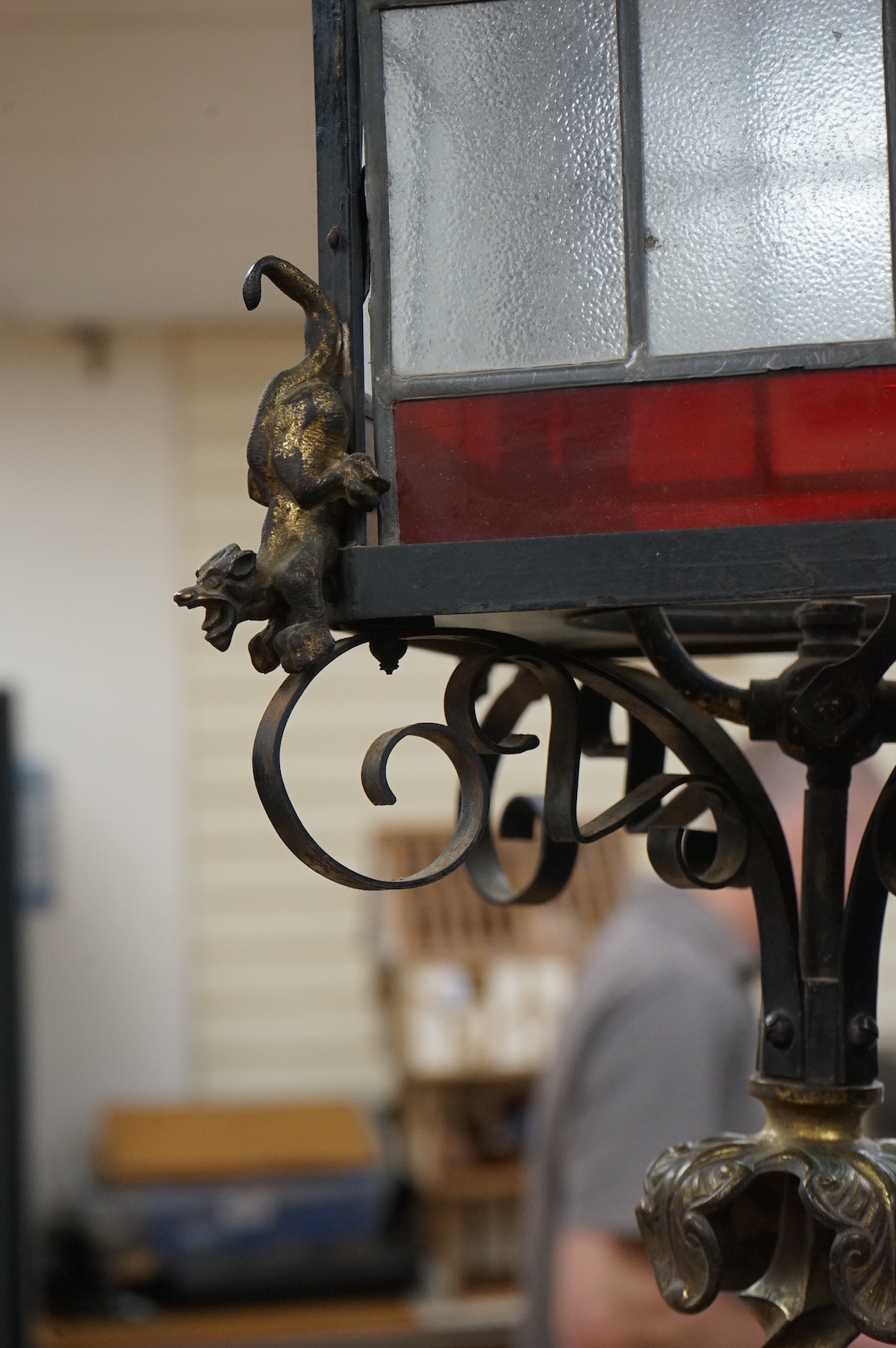 A large wrought iron and gilt bronze hall lantern, 94cm high